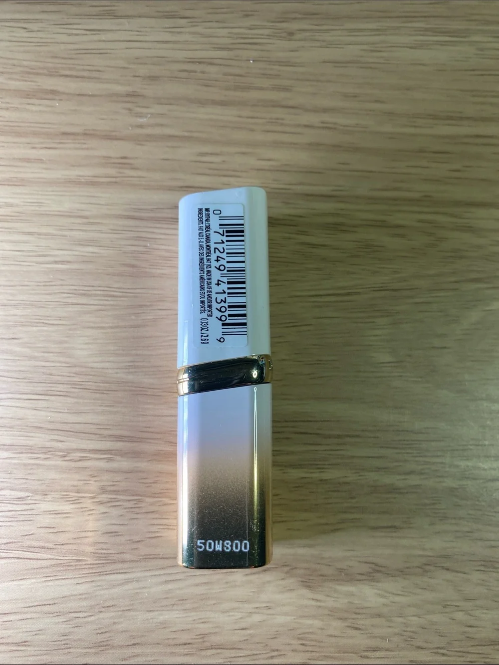L'Oreal Gold Lipstick Tube with Vibrant Fuchsia Label 206